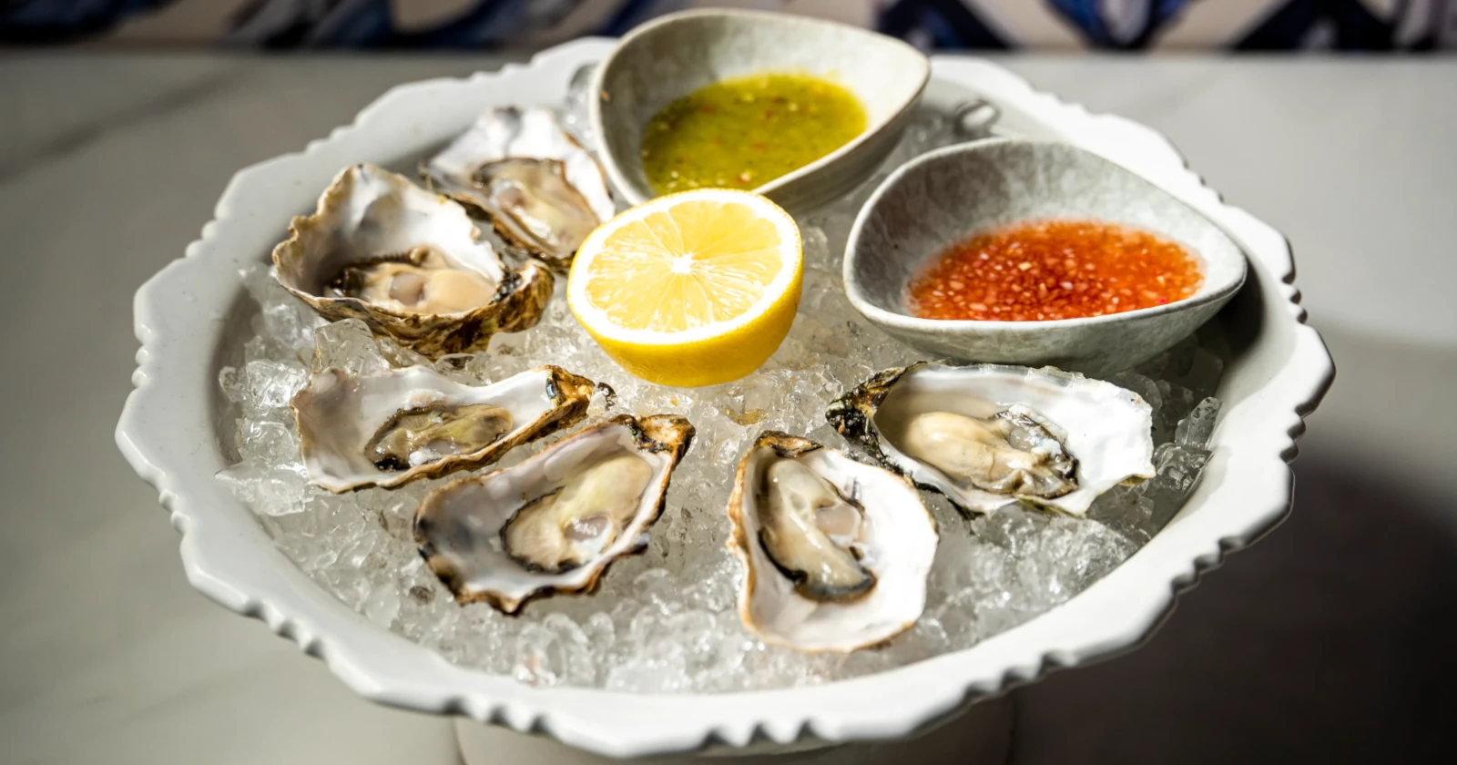 Amazing oysters with citrus at Pastel Rooftop bar in Bangkok.