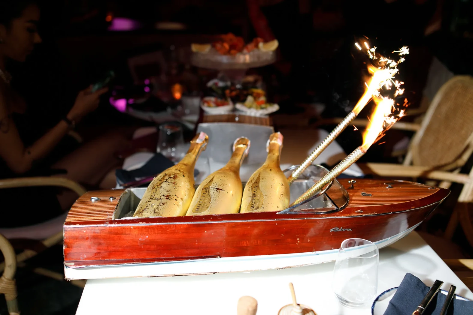 Bottle of champagne on a boat at the Pastel Rooftop Bar and Restaurant in Bangkok