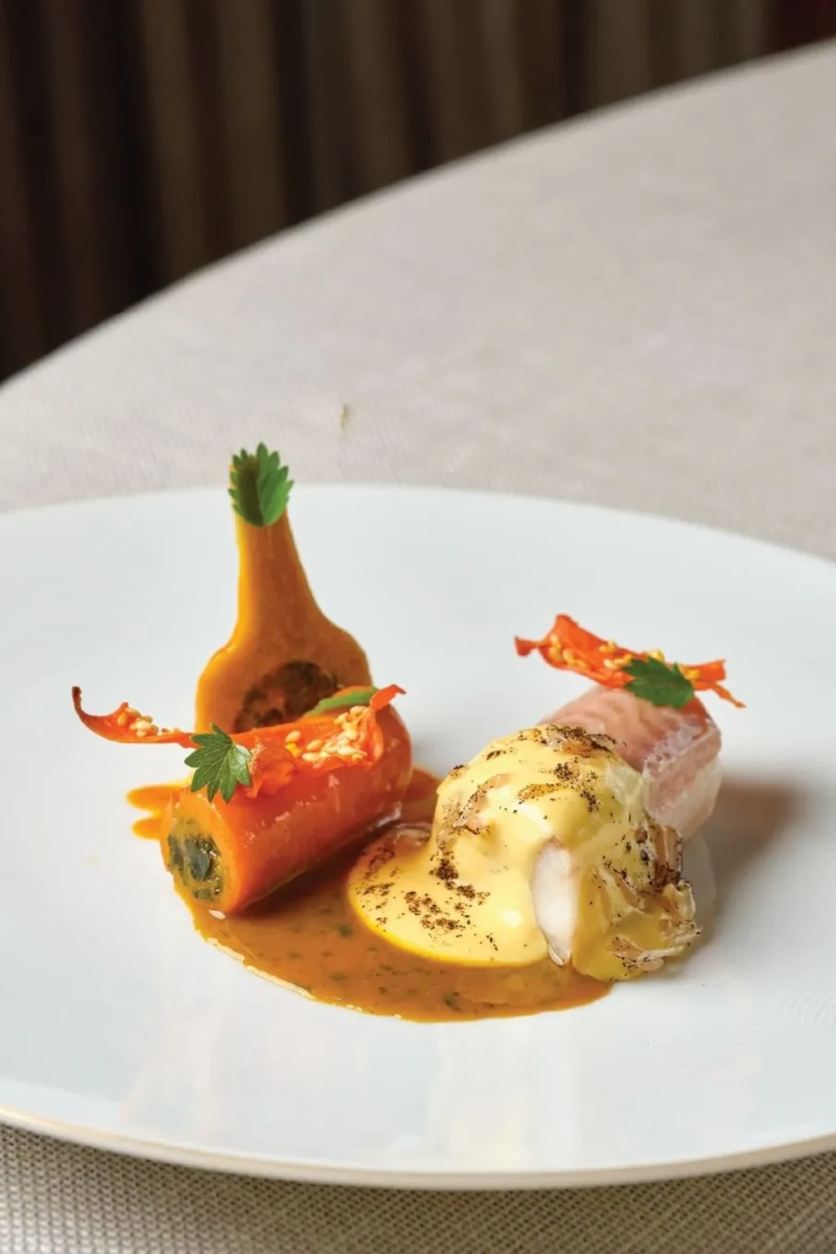 Delicate flavors of carrots and artichokes at Alain Ducasse, a French restaurant in Bangkok.