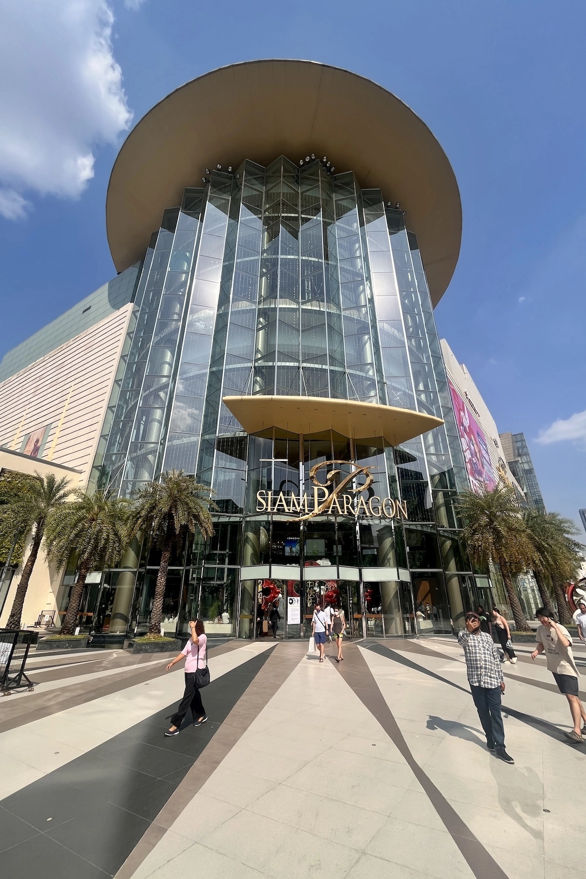 entrance of Siam Paragon in Bangkok Thailand during a beautiful day with a blue sky