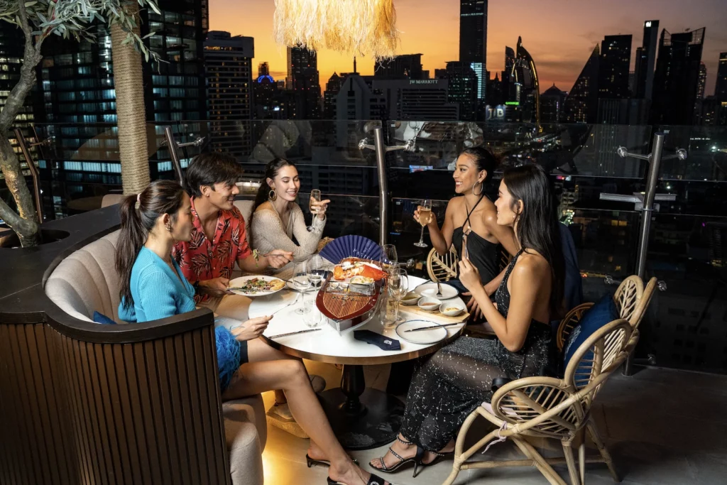 group eating a pastel yacht seafood platter at Pastel Bangkok in Sukhumvit Soi 11