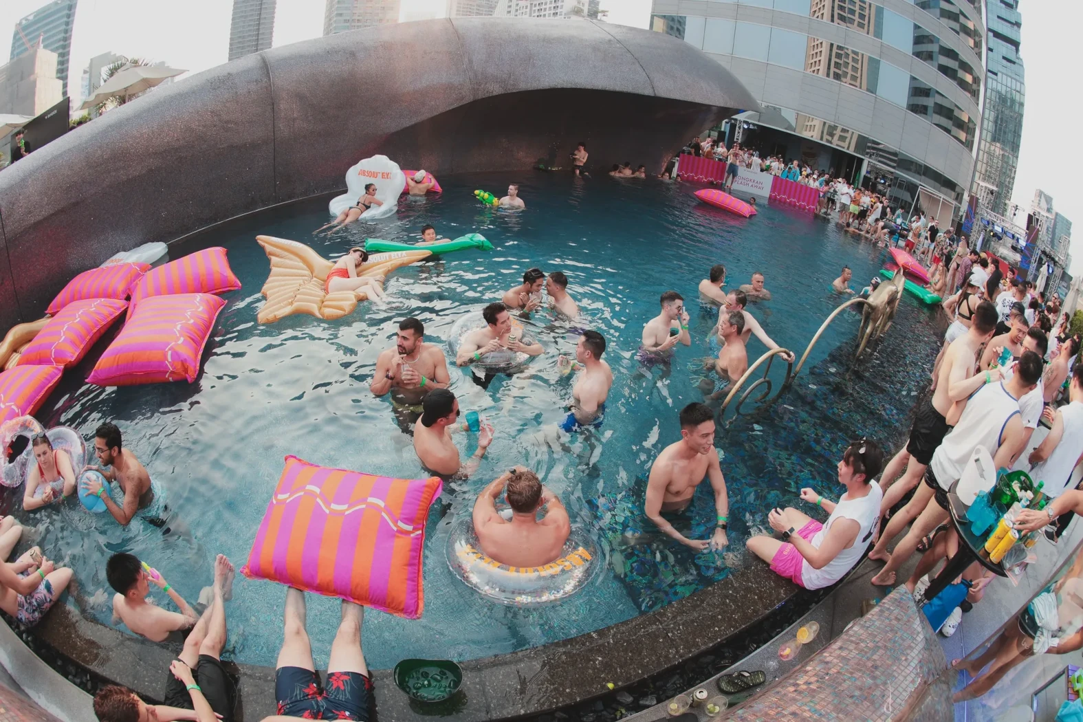 A lot of people partying at an awesome pool party at W Bangkok.