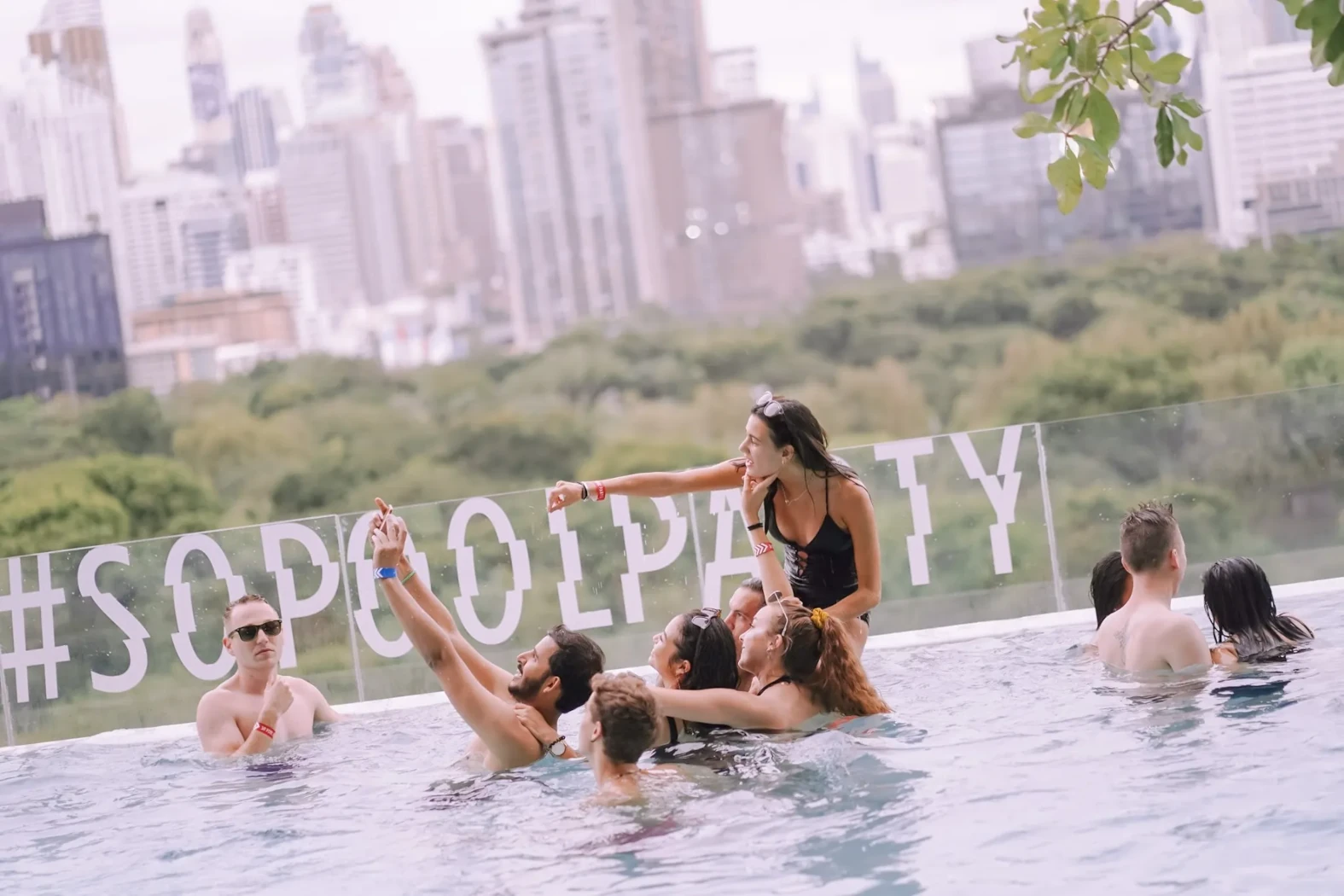 People enjoying and take a picture at the So Pool Party in Bangkok