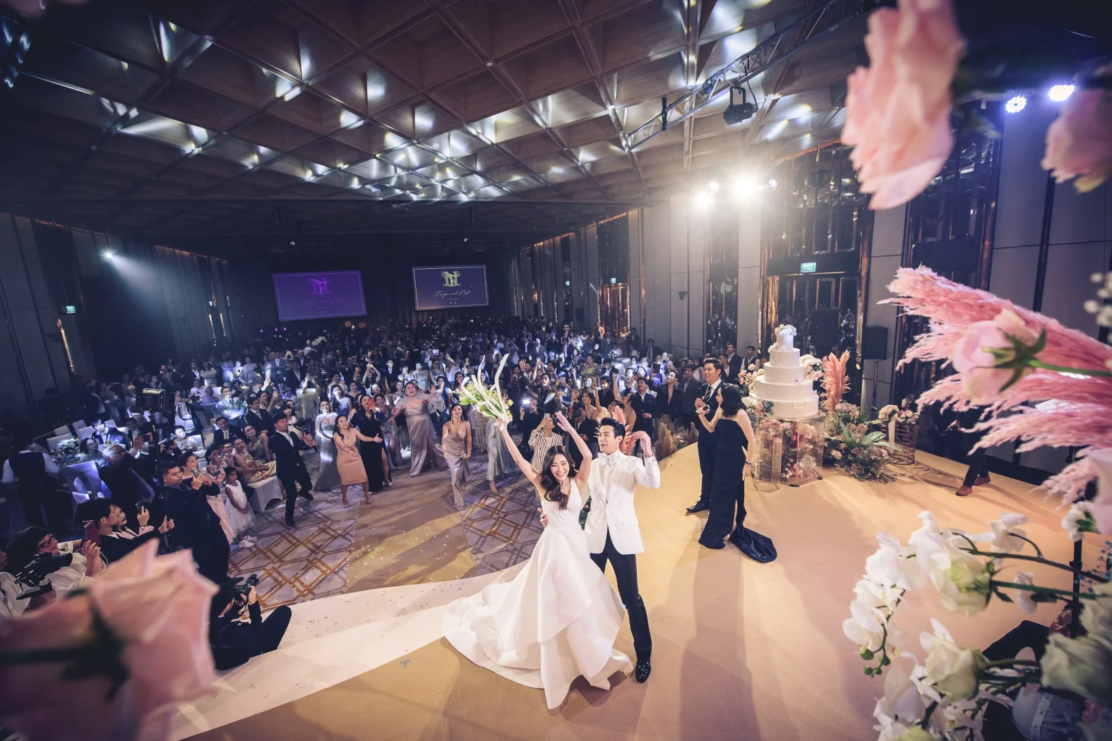 A wedding in a spacious ballroom at Hyatt Regency Bangkok hotel in Thailand